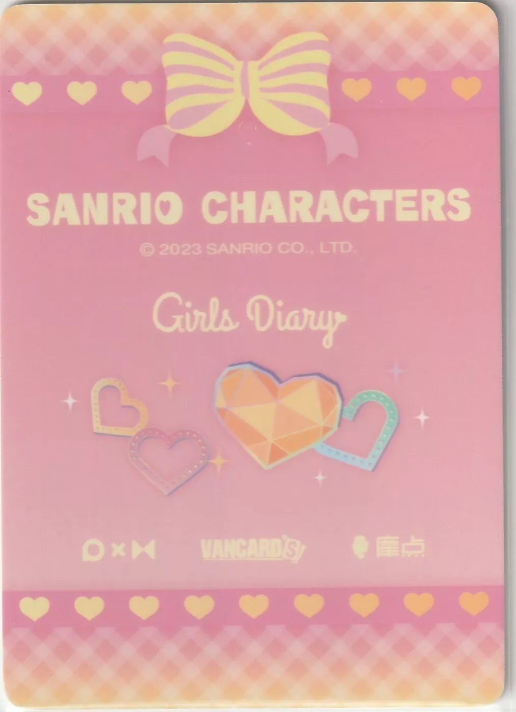 The back features a pink background with a yellow-striped bow at the top and multicolored sparkling hearts below the text "Girls Diary."