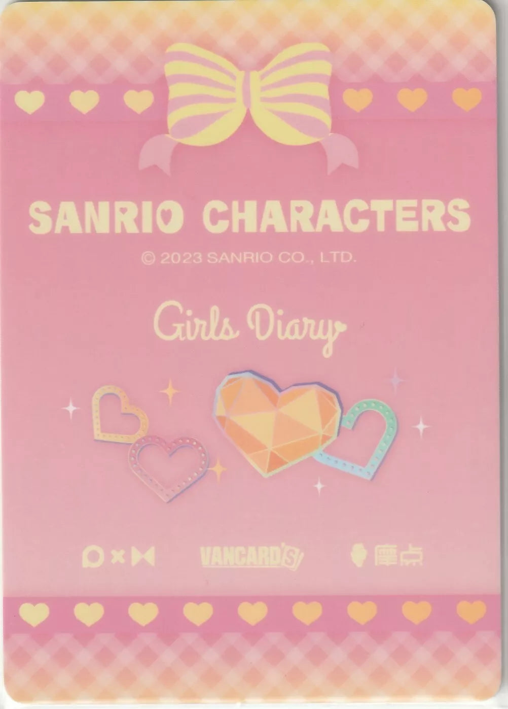 Sanrio Characters Girls Diary card back with a pink gradient, gem-like hearts, and a yellow bow, featuring a sparkle theme.