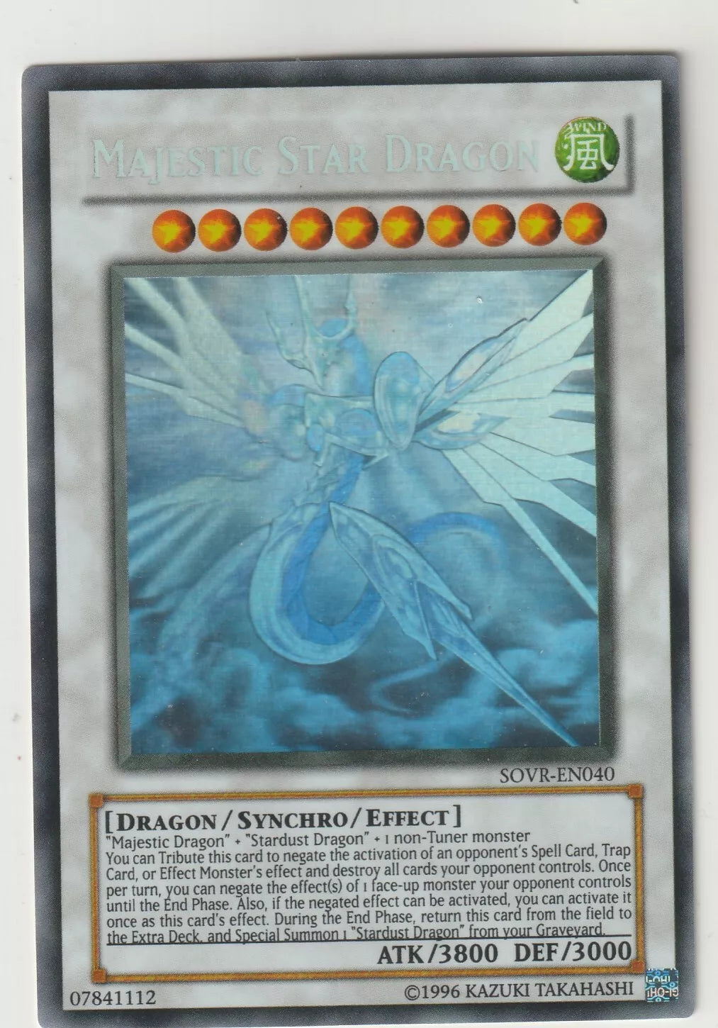 Near-mint Majestic Star Dragon Ghost Rare card featuring a holographic design from the Stardust Overdrive set.