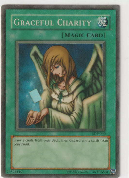 "Yu-Gi-Oh! card artwork of 'Graceful Charity,' depicting an angelic figure in a flowing robe, radiating a calm and generous aura."