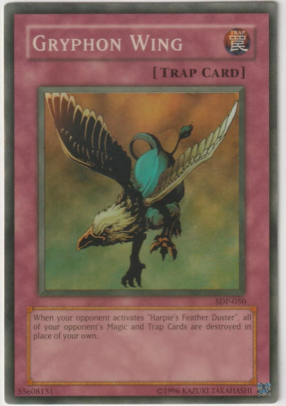 Gryphon Wing trap card depicting a powerful gryphon in flight against a colorful backdrop."