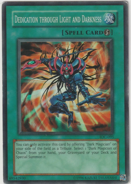 Super Rare Yu-Gi-Oh! Dedication Through Light and Darkness spell card from 2004 Invasion of Chaos IOC-095 set, featuring the Dark Magician of Chaos in a dynamic, vibrant artwork.