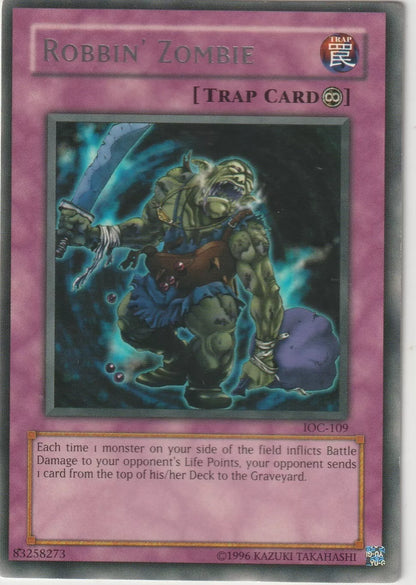 Rare Yu-Gi-Oh! Robbin' Zombie card from 2004 Invasion of Chaos IOC-109 set, featuring a zombie looting its victims, with dark and menacing artwork.