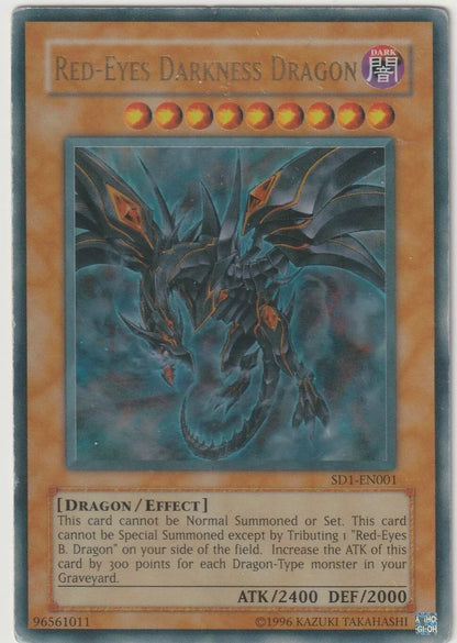 "Front of Yu-Gi-Oh! Red-Eyes Darkness Dragon SD1-En001, featuring a dark and fierce dragon."