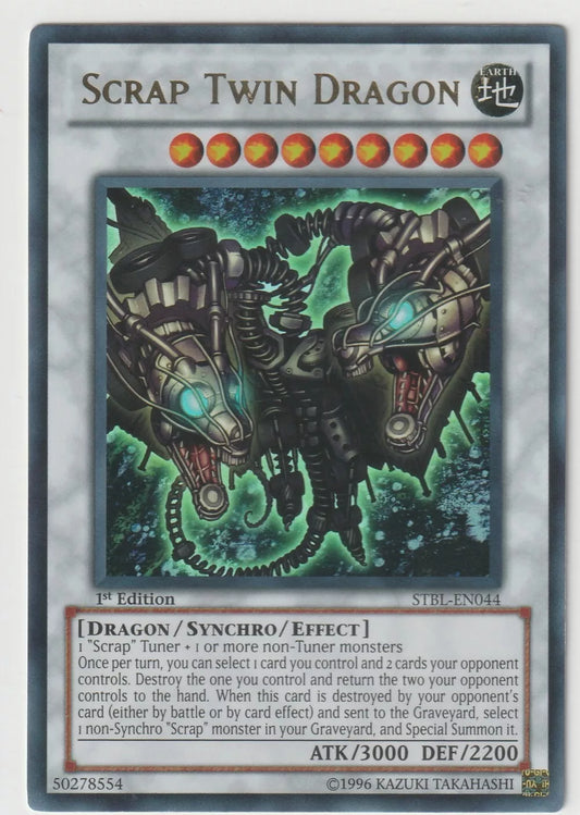  Yu-Gi-Oh! 2010 Starstrike Blast STBL-EN044 1st Ed Scrap Twin Dragon front view showing the twin-headed dragon in intricate design.